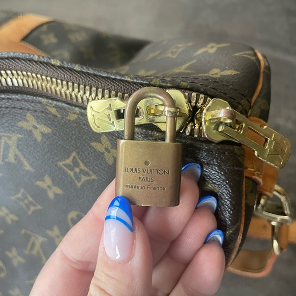 Louis Vuitton Monogram Keepall Bandouliere 55 - Picture 5 of 15